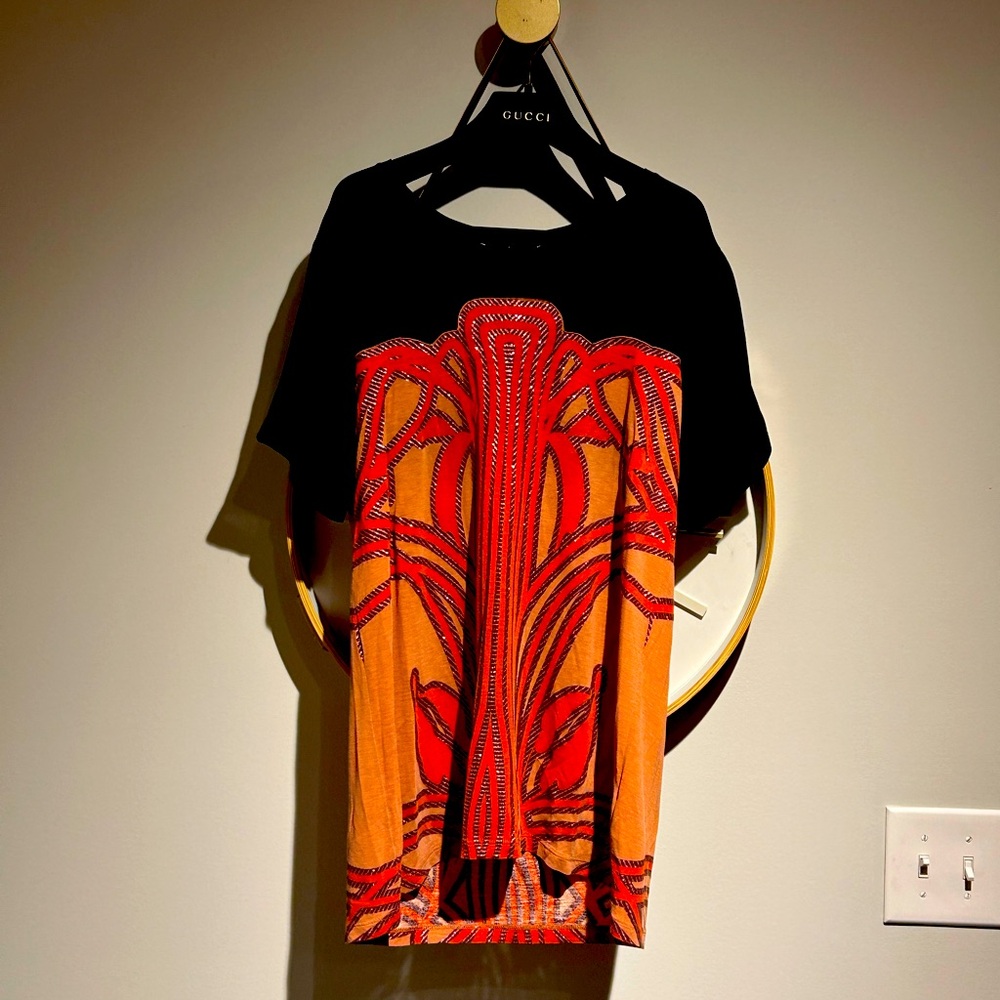 Gucci silk tshirt, sheer, with branding on neck. Gucci velvet hanger included!